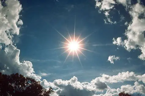 The sun is shining brightly in the sky
